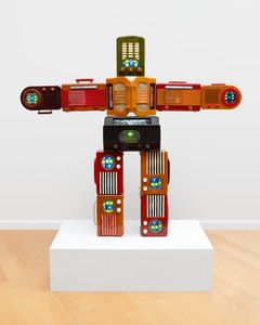 Nam June Paik Bakelite Robot, 2003. Single-channel video (color, silent), LCD monitors, Bakelite radios, electric lights, media player, and permanent oil marker, 50 ½ × 56 ⅜ × 9 inches (128.3 × 143.2 × 22.9 cm) © Nam June Paik Estate. Photo: Ben Blackwell