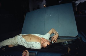 Nan Goldin French Chris on the convertible, New York City (1979) from The Ballad of Sexual Dependency, 1973–86. 126 archival pigment prints, in frames, each: 15 ¾ × 11 × 1 ⅛ inches (40 × 27.9 × 2.9 cm), overall dimensions variable, edition of 10 © Nan Goldin