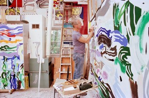Roy Lichtenstein working on River Scene (1987) in his Southampton studio, New York, c. 1987. Artwork © Estate of Roy Lichtenstein. Photo: © Bob Adelman