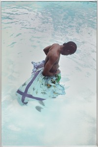 Tyler Mitchell Leo in Pool, 2026. UV print on plexiglass and mirror, in aluminum frame, 60 × 39 ⅞ × 2 inches (152.4 × 101.3 × 5.1 cm) © Tyler Mitchell. Photo: Owen Conway
