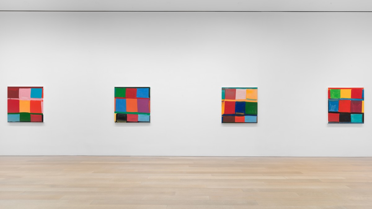 Installation of four painting comprising various colored rectangles