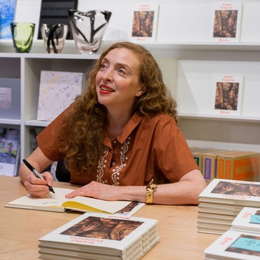 Rachel Feinstein signing copies of her book Mirror at the Gagosian Shop, New York, 2023. Photo: Mauricio Zelaya