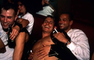 Nan Goldin, Nicolas, Clemens and Jens laughing at Le Pulp, Paris, 1999 © Nan Goldin