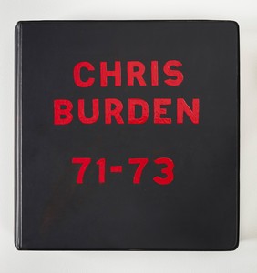 <p>Chris Burden, <em>Chris Burden Deluxe Photo Book 1971–73</em>, 1974, 53 photos in a loose-leaf binder with hand painted cover and cardboard box, 12 × 12 × 3 inches (30.5 × 30.5 × 7.6 cm), edition of 50. Photo by Johnna Arnold</p>