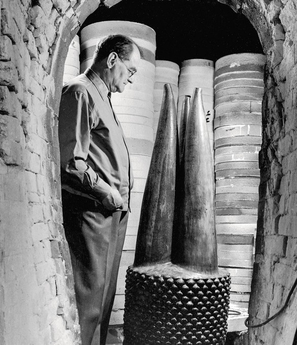Axel Salto looking at the sculpture The Core of Power&nbsp;in the kiln, 1956, CLAY/Royal Copenhagen Collection. Photo: Aage Strüwing