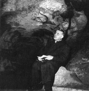 Georges Bataille inspecting the cave paintings at Lascaux, Montignac, France