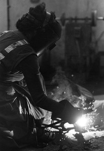 Feliza Bursztyn welding in her studio in Bogotá, c. 1979. Photo: Rafael Moure