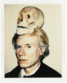 Andy Warhol, Self-Portrait with Skull, 1977, Polaroid Polacolor Type 108, 4 ¼ × 3 ⅜ inches (10.8 × 8.6 cm). The Andy Warhol Museum, Pittsburgh; Founding Collection, Contribution The Andy Warhol Foundation for the Visual Arts, Inc.