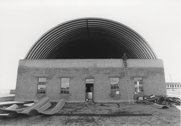 Donald Judd inspecting the new roof on the south Artillery Shed, Marfa, Texas, c. 1984. Photo: courtesy the Chinati Foundation Archives