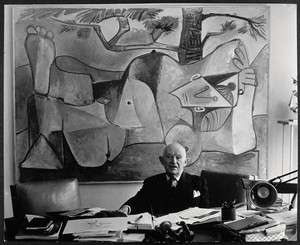 <p>Brassaï, <em>Kahnweiler in his office on rue Monceau, before a painting by Picasso</em>, 1962</p>