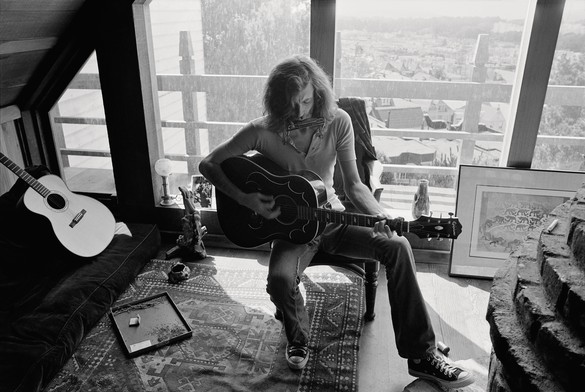 Graham Nash at home, San Francisco, 1972. An M. C. Escher print from his collection can be seen on the floor to the right. Photo: Joel Bernstein