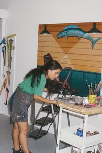 Portrait of Julie Curtiss working in her studio