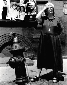 Rebecca Cammisa's black and white image of Sister Helen on 142nd Street in Mott Haven, 1996.