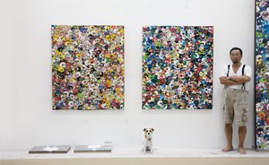 <p>Takashi Murakami with his dog, Pom, <em>Full Steam Ahead</em>, <em>Dark Matter in the Farthest Black Reaches of Visible Space</em>, and <em>Blue Flowers &amp; Skulls</em> (all 2012), Kaikai Kiki Co., Ltd., studio, Saitama, Japan, 2012</p>
