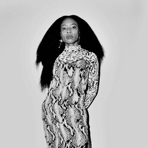 Black and white portrait of Jenn Nkiru