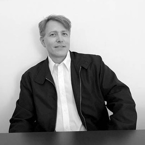 Black and white portrait of Eli Diner