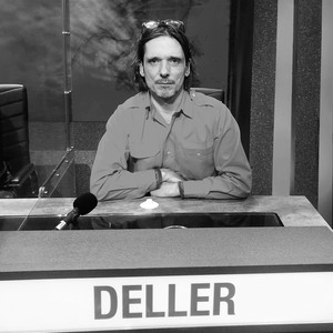 Black-and-white portrait of Jeremy Deller