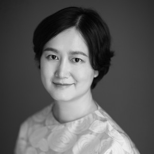 Black-and-white portrait of Dr. Shen Qilan