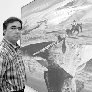 Black-and-white portrait of Mark Tansey