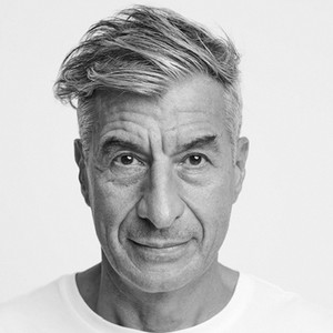 Black-and-white portrait of Maurizio Cattelan