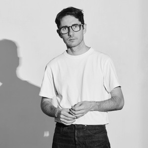 Black-and-white portrait of Dan Fox