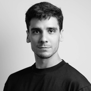 Black-and-white portrait of João Menegussi