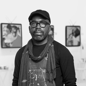 Black and white portrait of Derrick Adams