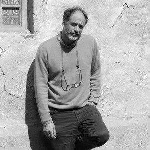 Black-and-white portrait of Luca Guadagnino