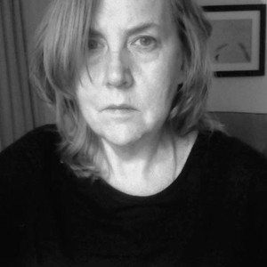 Black-and-white portrait of Dodie Bellamy