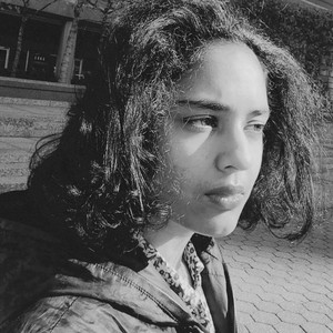 Black-and-white portrait of Allie Biswas
