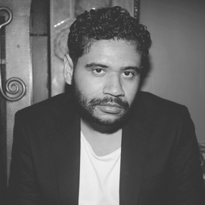 Black-and-white portrait of Carlos Valladares