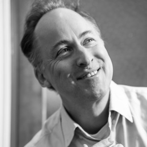 Black and white portrait of Sebastian Smee