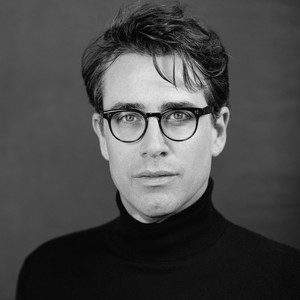 Black-and-white portrait of Benjamin Moser