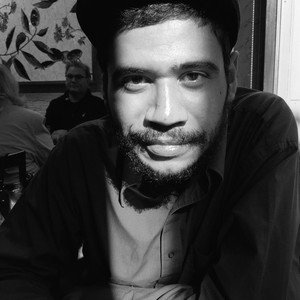 Black-and-white portrait of Carlos Valladares