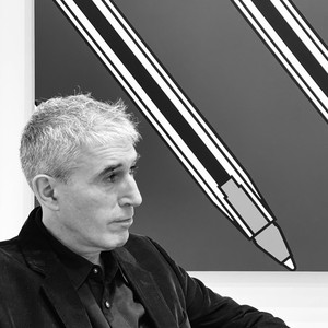 Black-and-white portrait of Adam McEwen