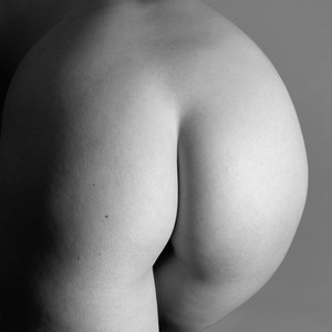 Black-and-white image of buttocks