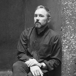 Black and white portrait of Justin Beal