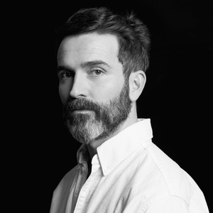 Black and white portrait of Daniel Roseberry