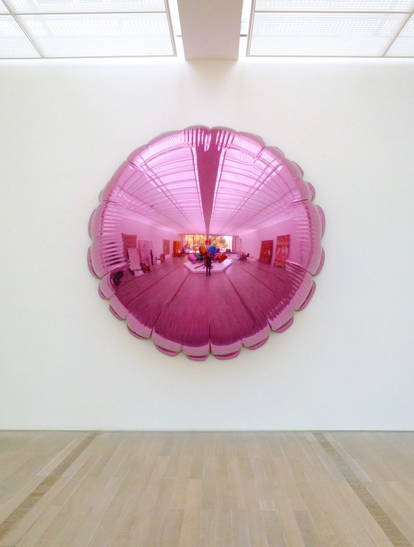Moon (Light Pink), 1995–2000, mirror-polished stainless steel with transparent color coating, 130 × 130 × 40 inches (330.2 × 330.2 × 101.6 cm)