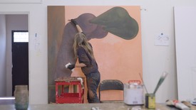 Louise Bonnet working in her studio on a new painting