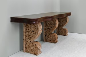 Walnut and tuff stone console conceived in 1941 by Curzio Malaparte