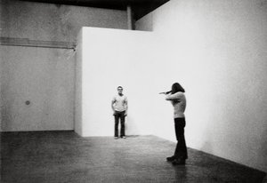 A person about to shoot another person in a gallery